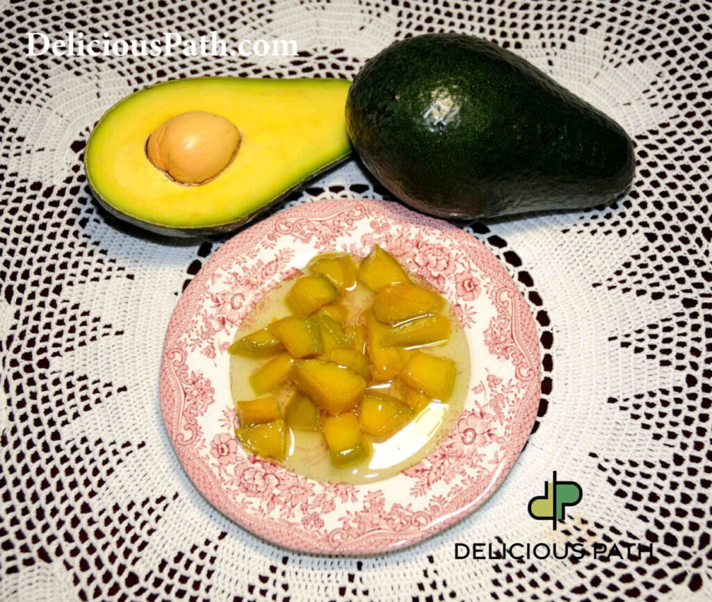 Avocado and preserved fruit on a small plate symbolizing empathy, food, and slow travel psychology