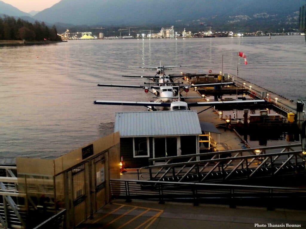 Seaplanes docked at Vancouver Harbour Flight Centre terminal in Coal Harbour Vancouver British Columbia Canada
