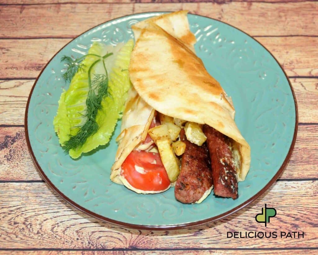 arabic pita filled with sausage and vegetables on a plate, expressing persistence, sailing rhythm, and psychological continuity