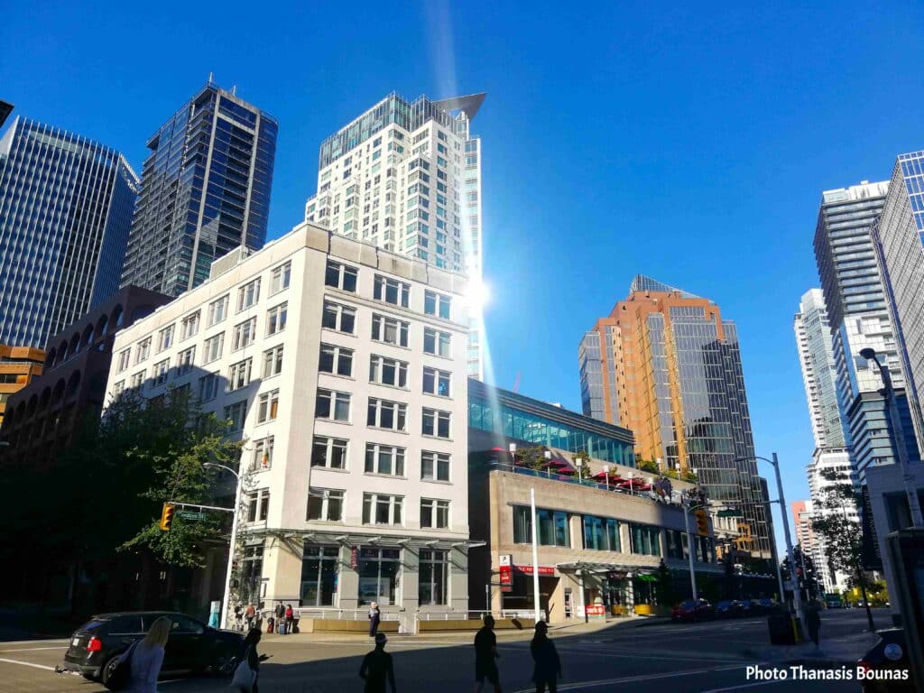 Modern office and residential buildings along a city street in Downtown Vancouver British Columbia Canada
