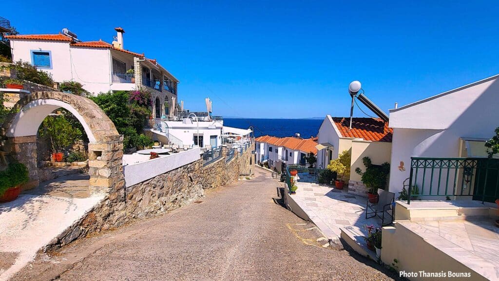 Tyros Peloponnese coastal village street sea view traditional houses Greece
