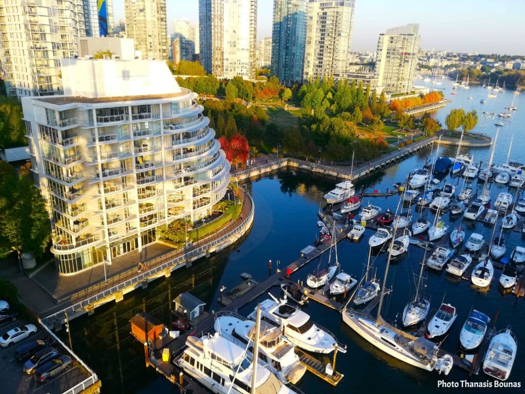 False Creek marina with sailboats and waterfront buildings in Vancouver, British Columbia, Canada