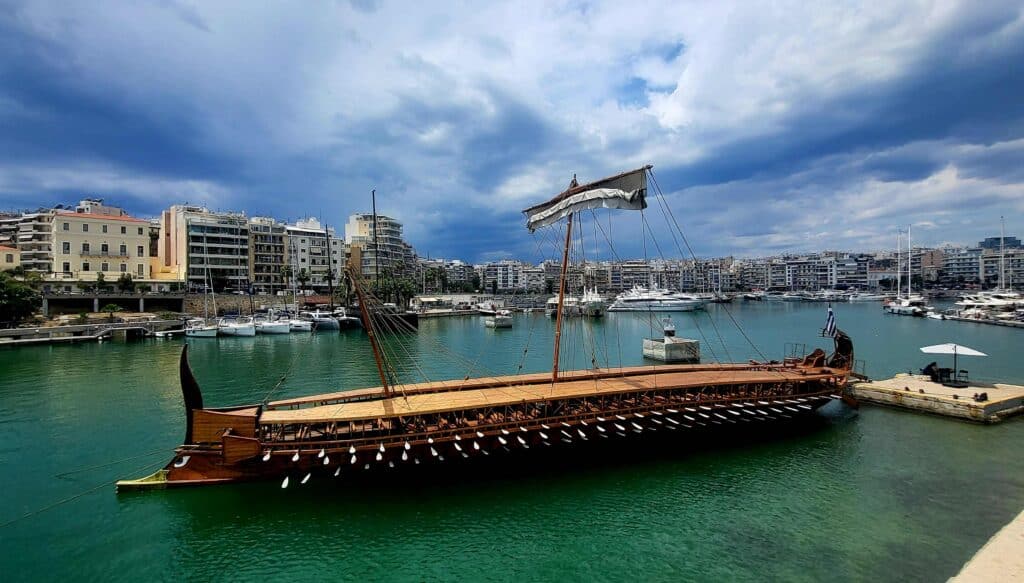 Traditional wooden sailing vessel in harbor symbolizing belonging, travel psychology, and the deep connection between sea, memory, and seamanship
