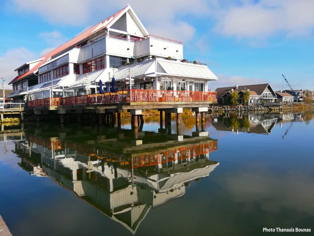 Steveston Harbour Richmond waterfront building reflection in water with fishing port atmosphere