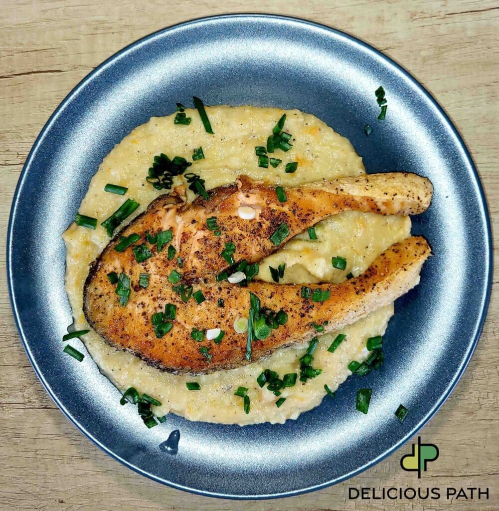Salmon dish symbolizing connection, sailing philosophy, and travel psychology through food
