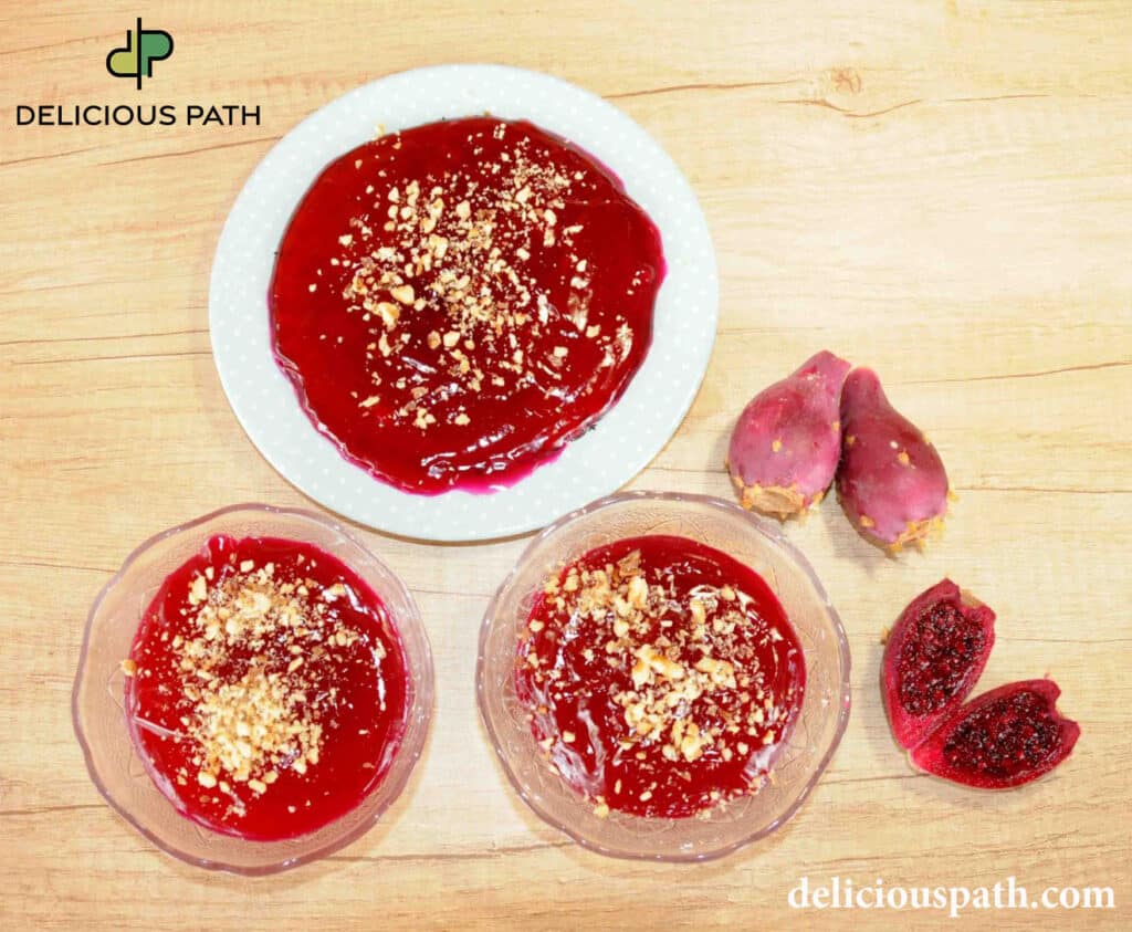 Red fruit cream dessert on wooden surface symbolizing curiosity, food, and the psychology of slow travel