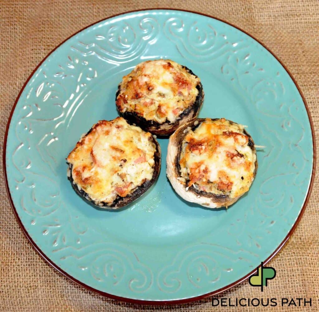 Stuffed mushrooms on turquoise plate reflecting sailing grace and food philosophy