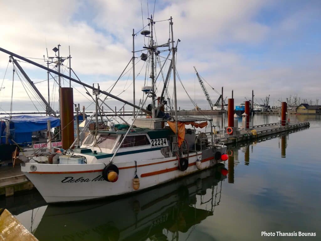 Fishing boat moored at a marina in Canada reflecting travel, respect for working vessels, and connection to the sea