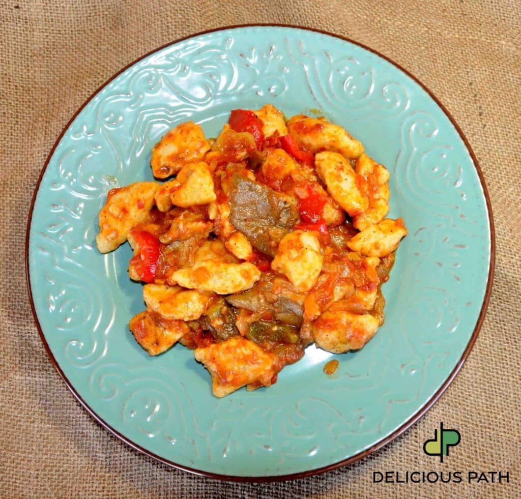 Handmade gnocchi with mushroom and tomato sauce symbolizing risk and creativity in travel and sailing life