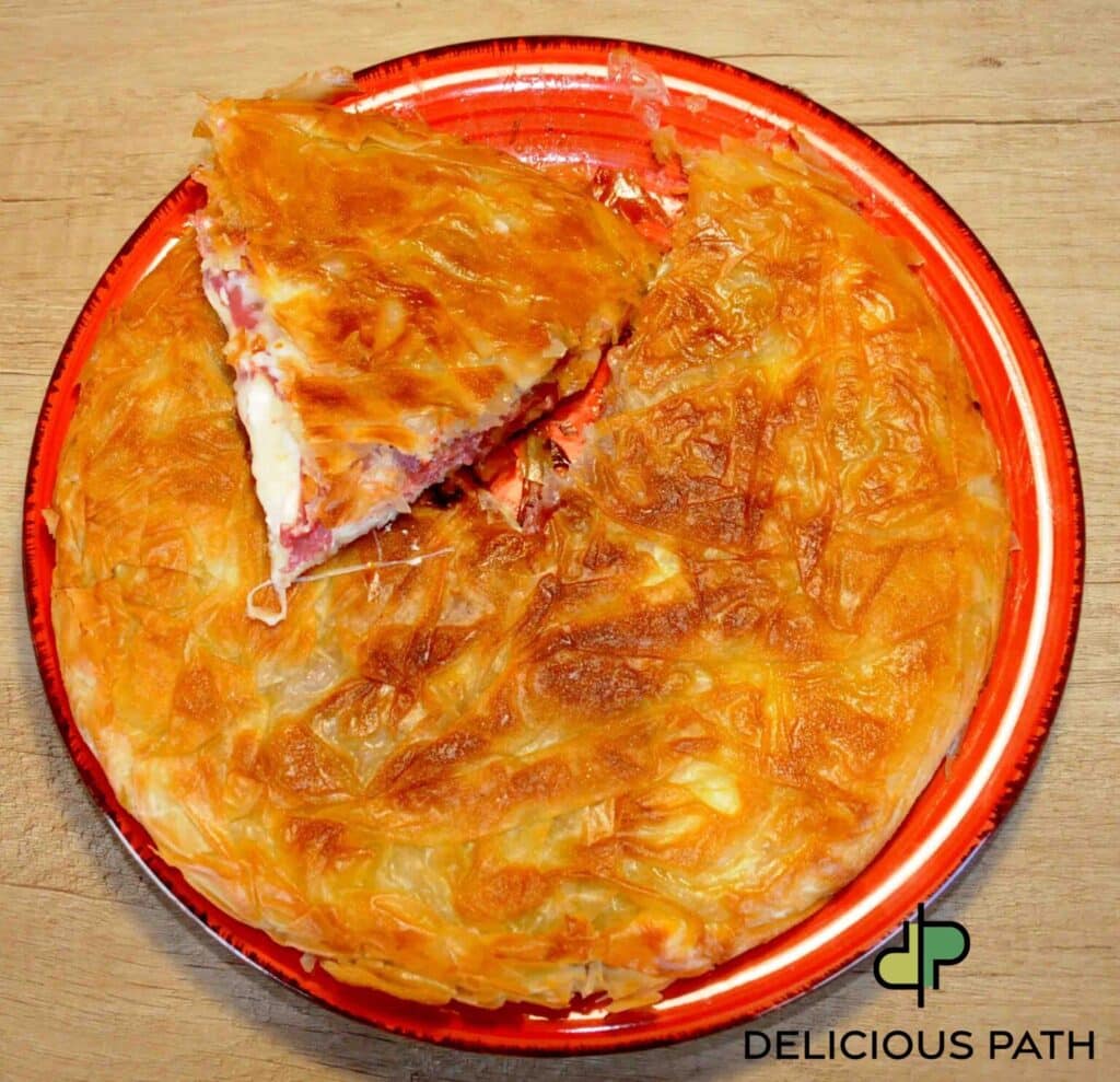 Golden baked pie with crispy crust and slice removed symbolizing Sailing and Calm through food ritual