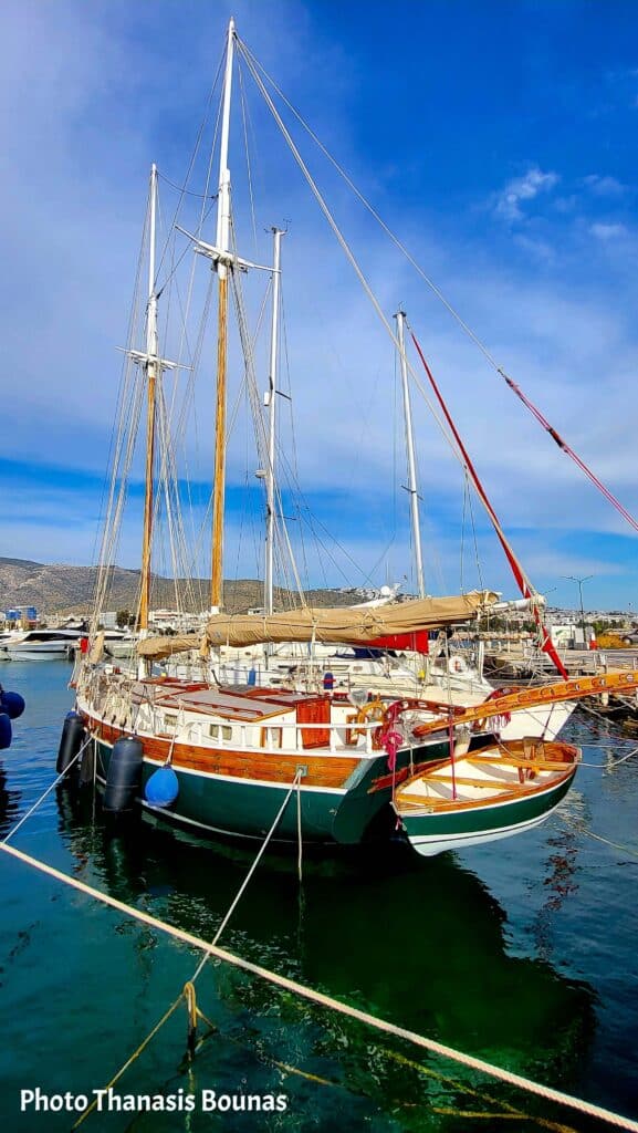 Wooden sailing boat in marina reflecting sailing grace and psychological balance