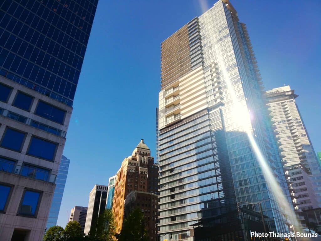 Modern glass skyscraper and downtown buildings in Vancouver British Columbia Canada
