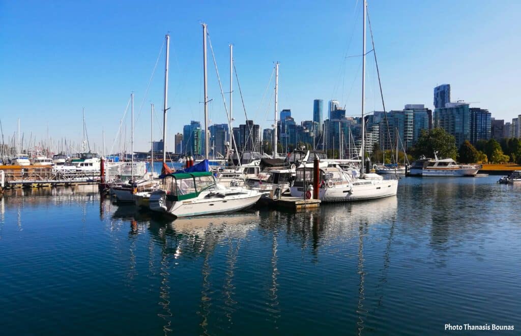 Boats moored at Coal Harbour near Vancouver Rowing Club Vancouver British Columbia Canada  