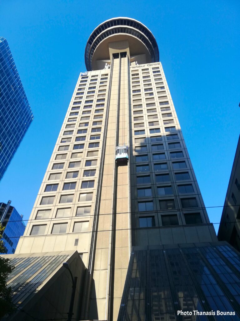 Harbour Centre tower in downtown Vancouver with Vancouver Lookout observation deck reflecting urban travel experience