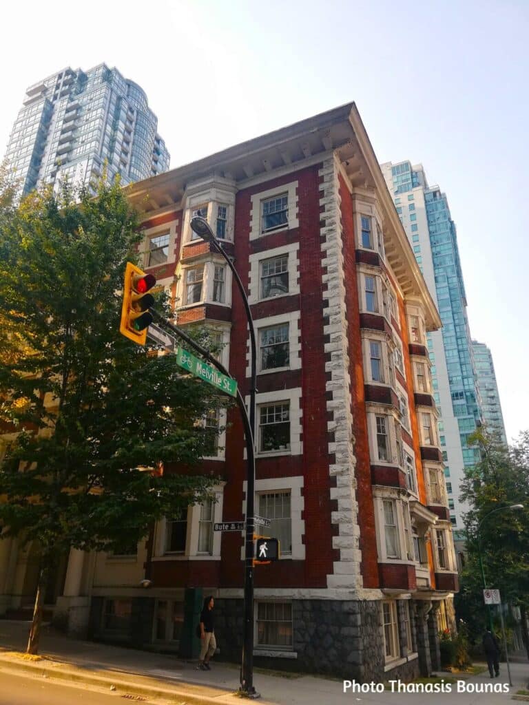 Historic red brick corner building at Melville Street in downtown Vancouver British Columbia Canada
