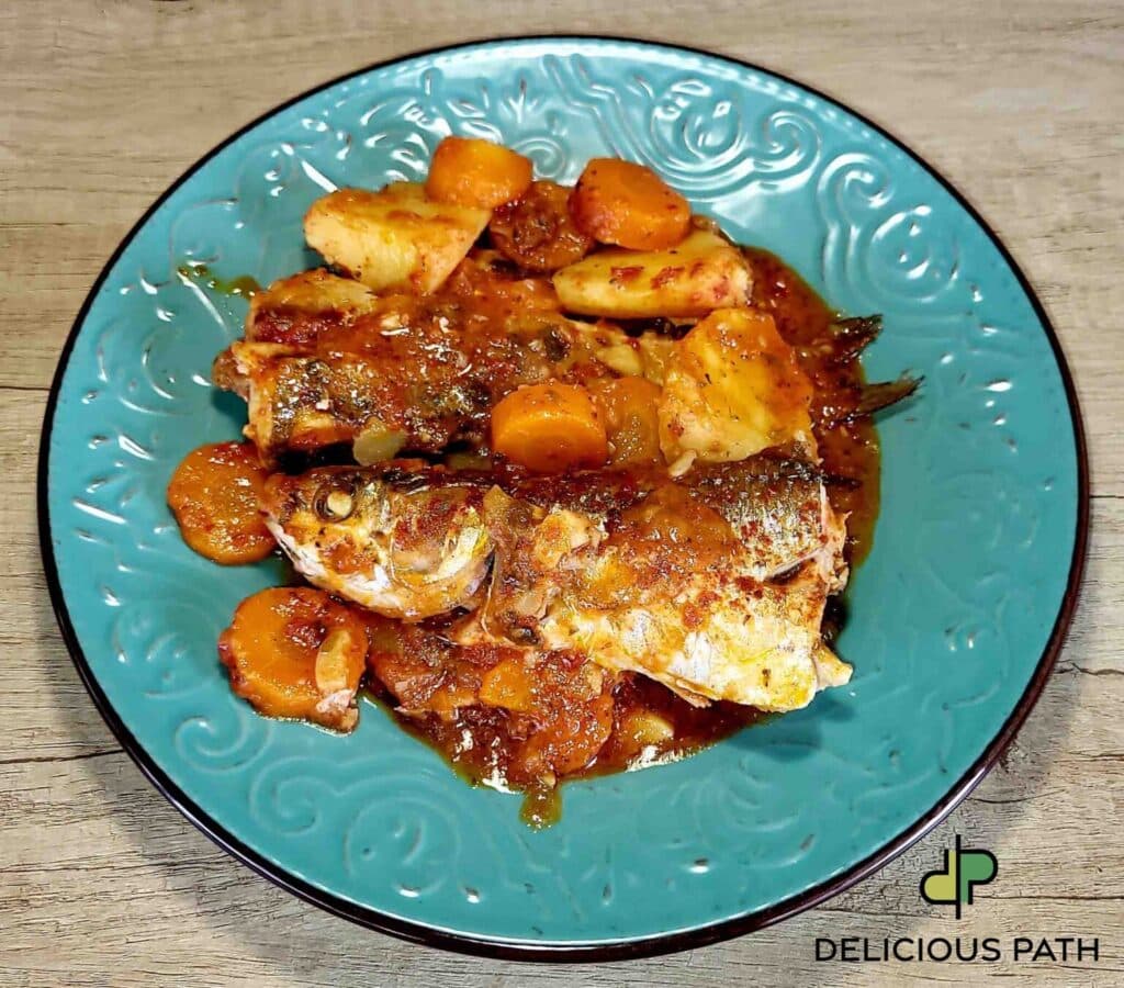 Traditional fish stew on a plate symbolizing vulnerability, food, travel, sailing, and the psychology of exposure