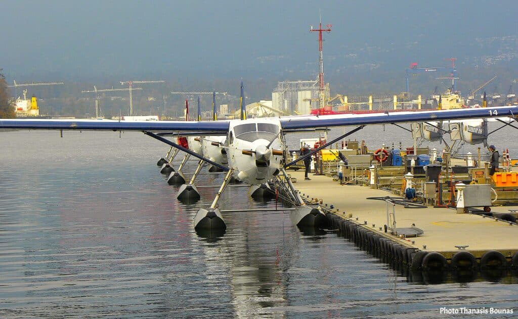 Floatplane at harbor dock symbolizing travel memory, nostalgia, and quiet love