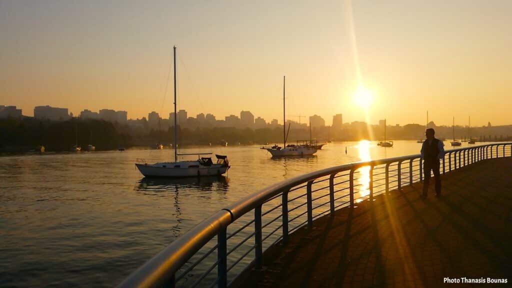 Sailboats resting on calm water during sunset at False Creek Vancouver