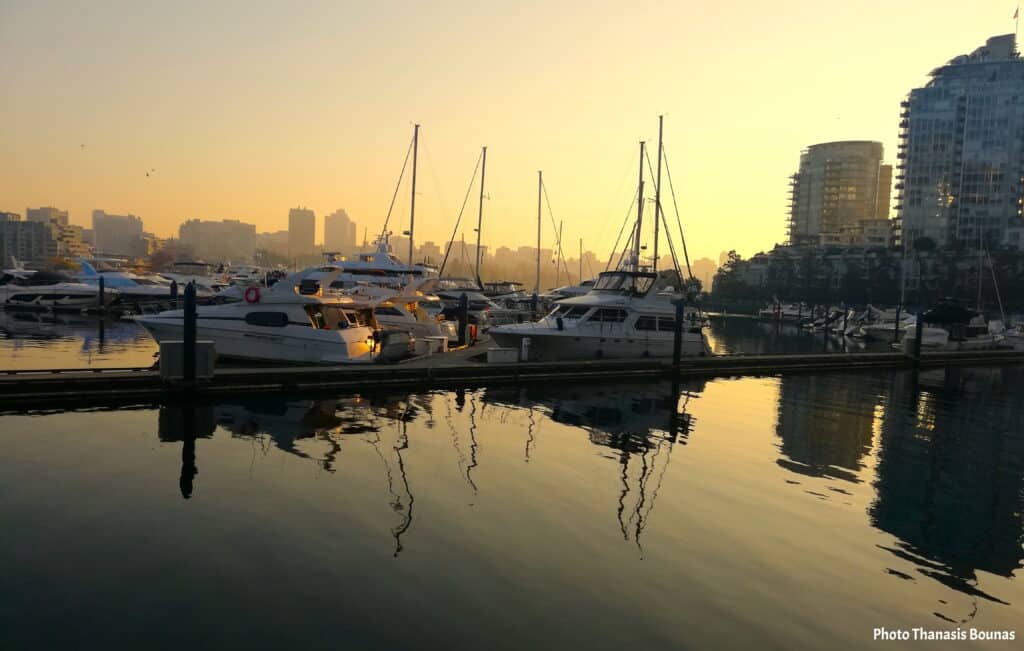 Sunset reflections at False Creek marina in Yaletown Vancouver
