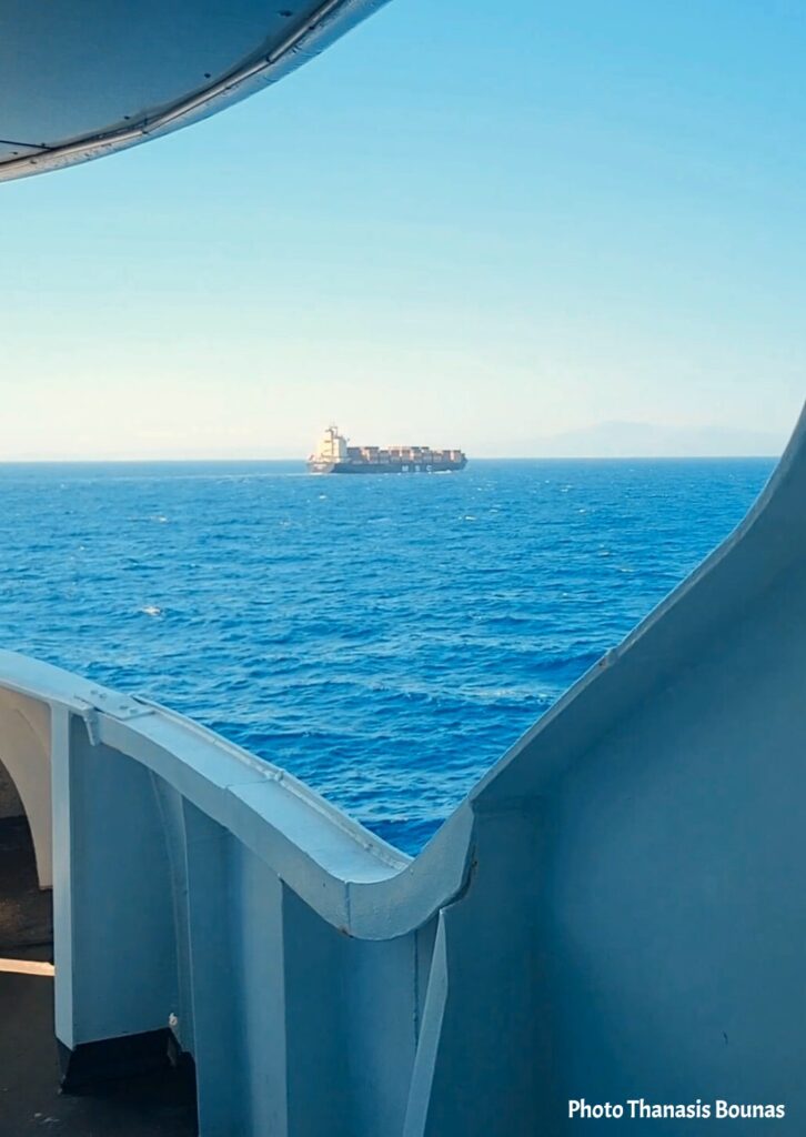 Sailing towards Andros across the blue waters of the Aegean Sea in Greece