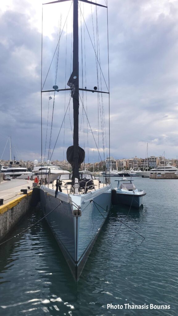 Sailing boat under sail on the Saronic Gulf heading toward Poros Greece