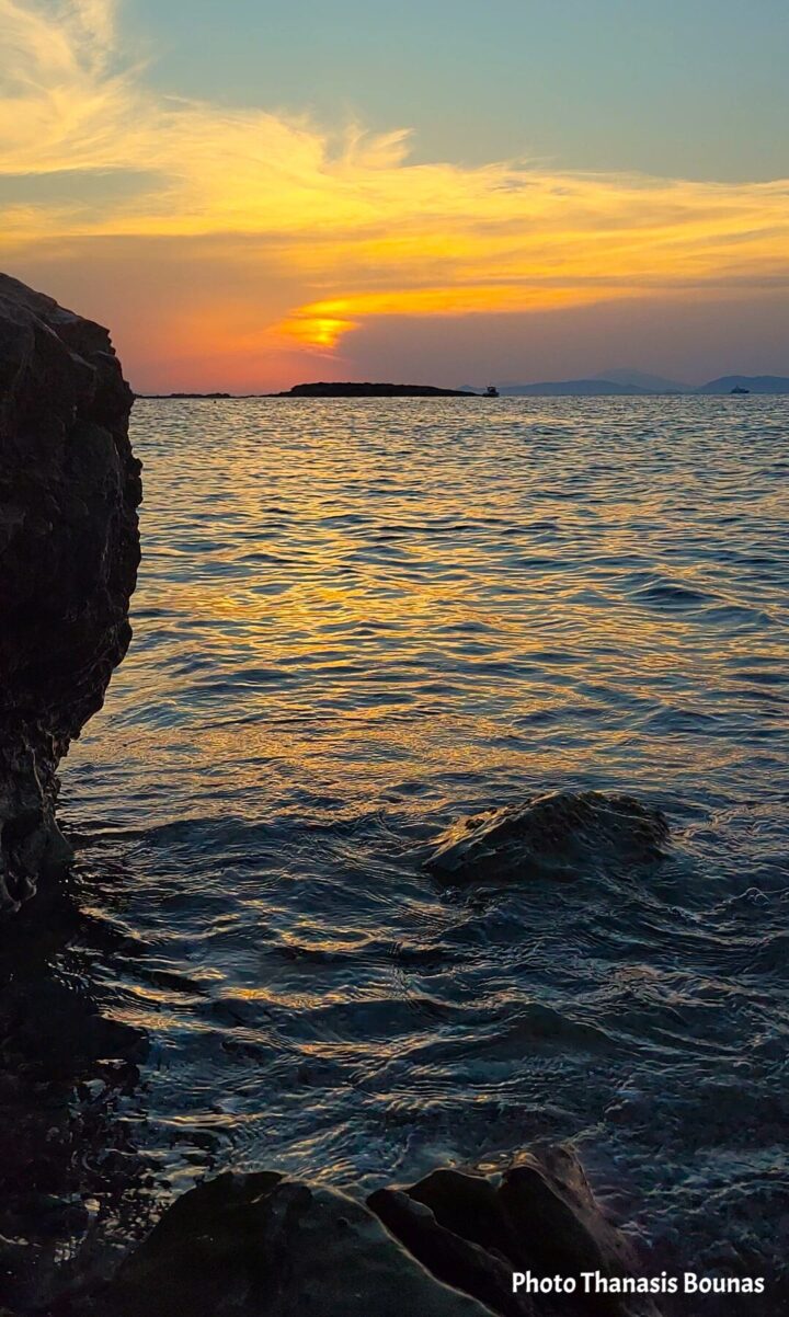 The last light of the day over the Aegean Sea from the rocky coast of Kalymnos, Greece. Photo by Thanasis Bounas.