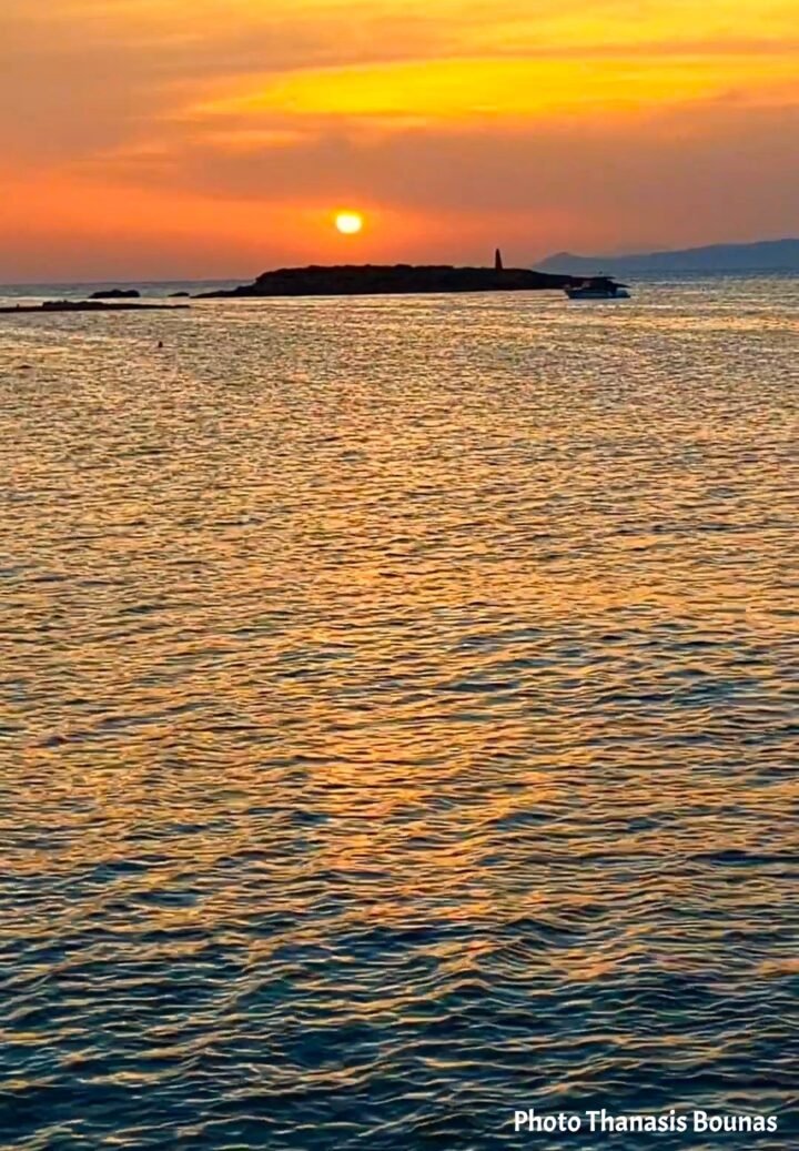 A golden sunset over the Aegean Sea among the islands of the Dodecanese, Greece. Photo by Thanasis Bounas.