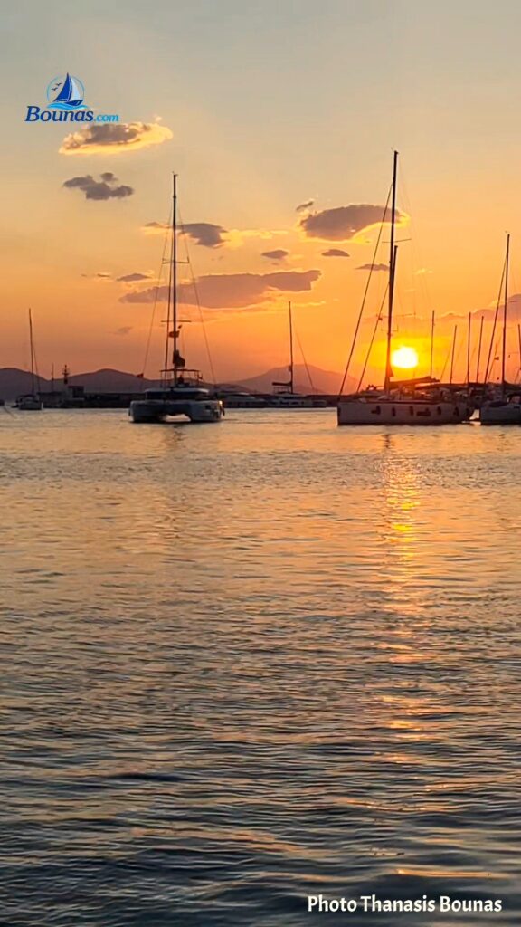 Sailboats at sunset in Folegandros, Greece